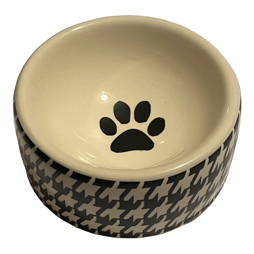 Houndstooth print Ceramic dog bowl black and white  paw print inside.